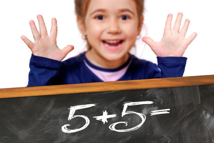 Girl raising her hands