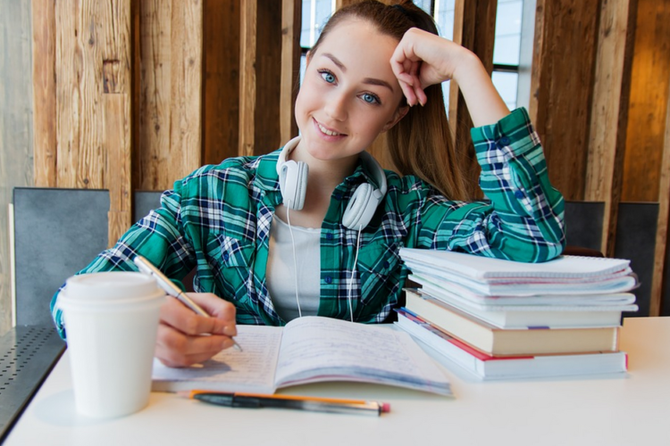 a girl doing assignment